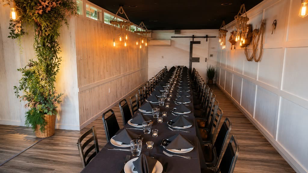Estime's Café Private Event Dining Room Table Setup with Botanical Floral Wall in Colonia NJ